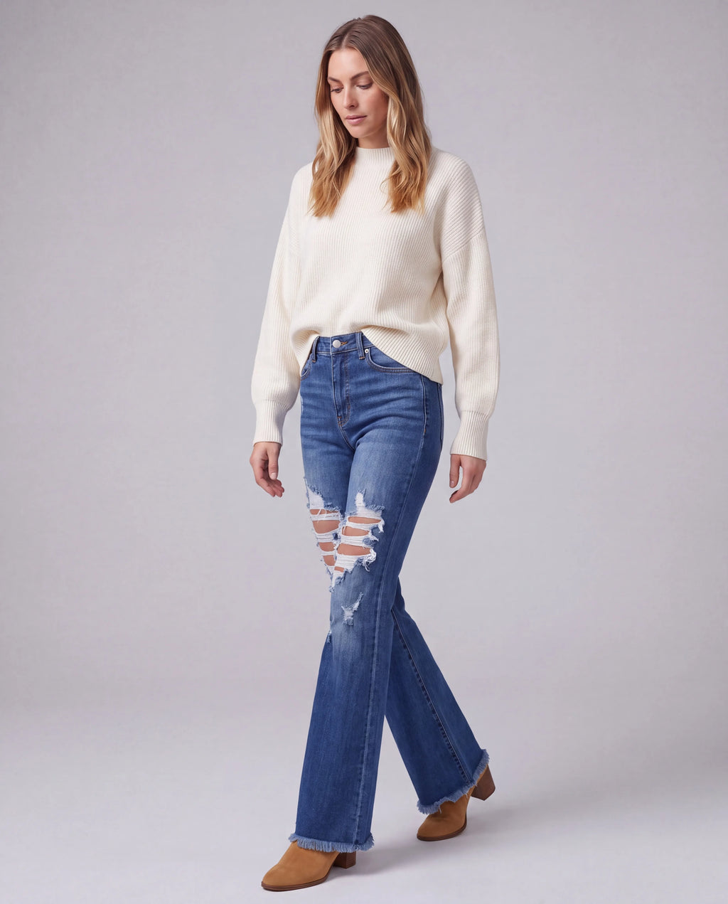 Selene High-Rise Flared Jeans, walking three-quarter view