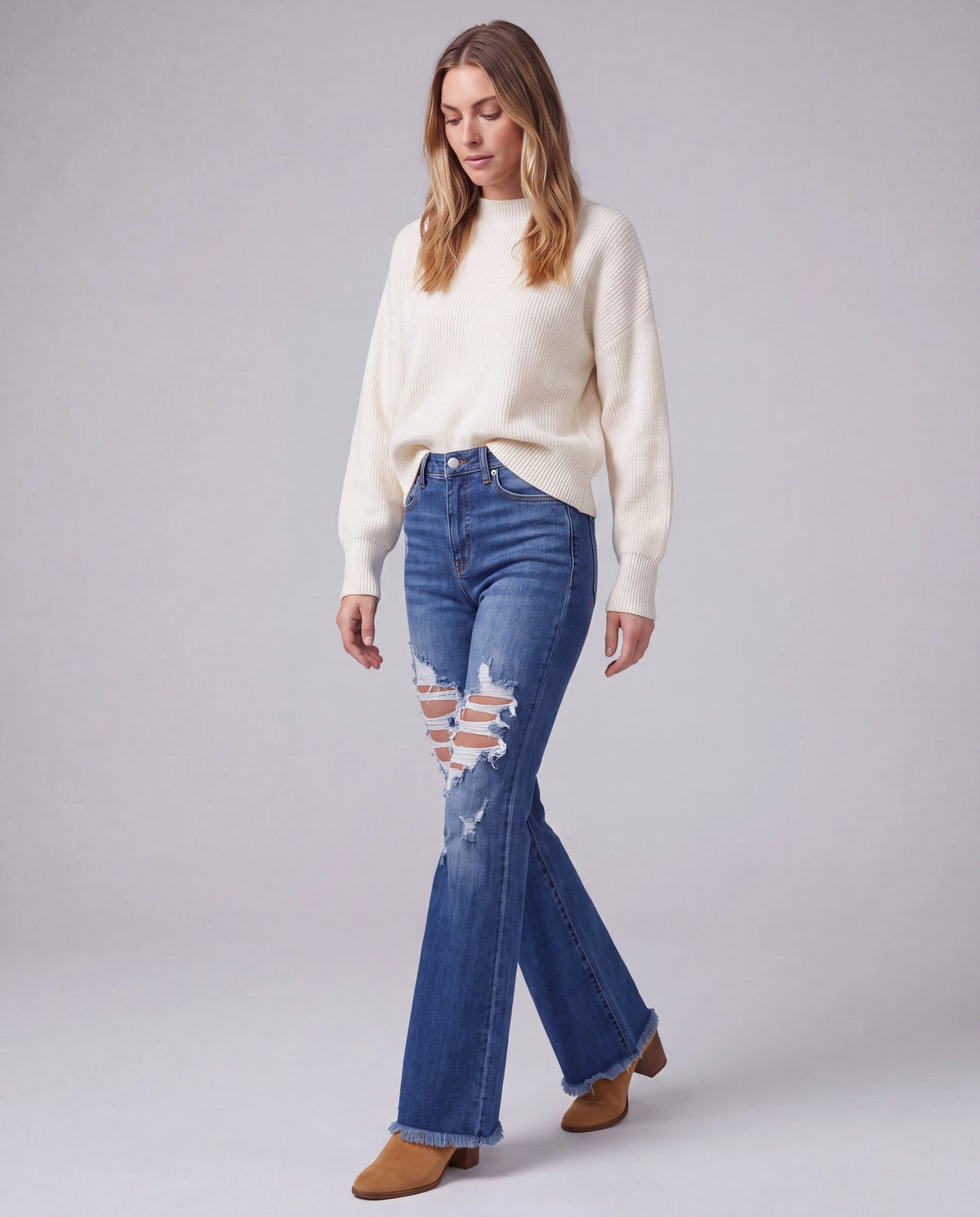 Selene High-Rise Flared Jeans, walking three-quarter view