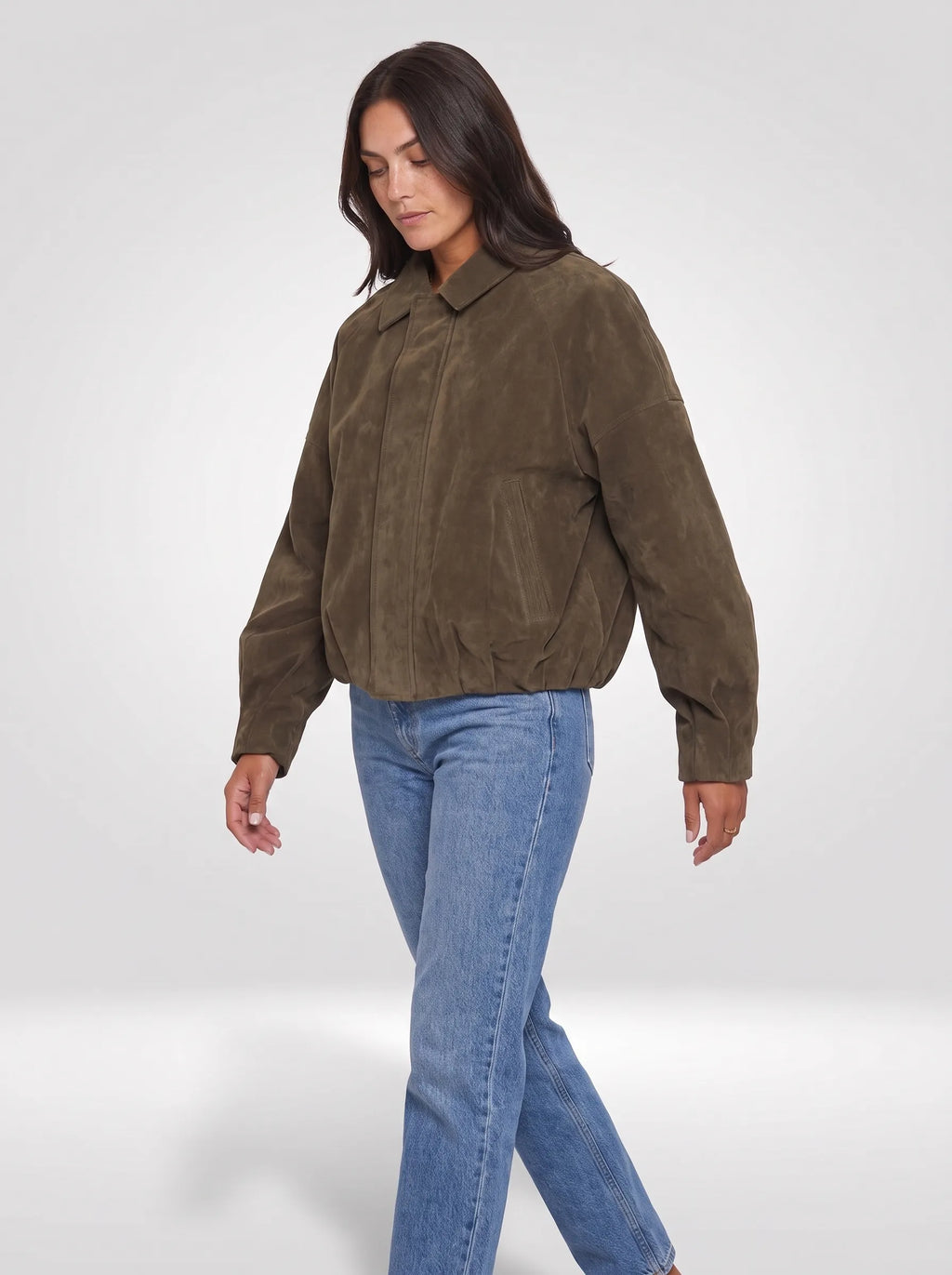 Sloane Faux Suede Bomber Jacket – Olive, walking three-quarter view