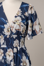 Mirelle Smocked Maxi Dress detail: deep V-neck, flutter sleeve and smocked stretch waist