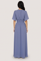 Mirelle Smocked Maxi Dress in dusty blue, back view
