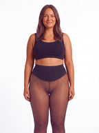 Caramel fleece-lined tights shown on an adult model with golden bronze skin
