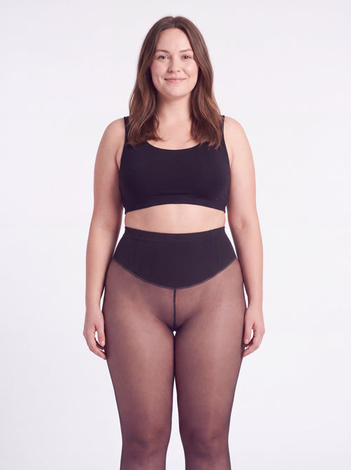 Vanilla fleece-lined tights shown on an adult model with fair light skin