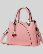 Women's Top-Handle Cherry Handbag with Charm, Structured Curved Panels – Sadie Grey